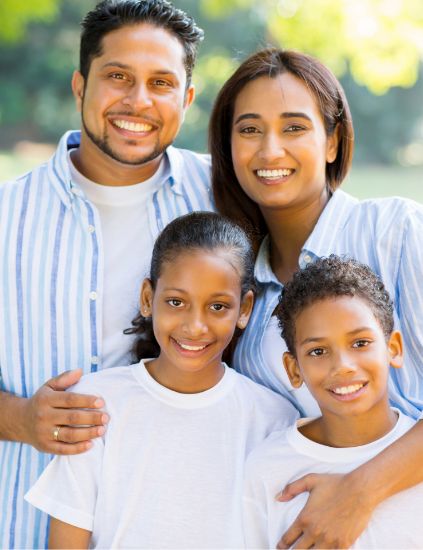 family of four in park